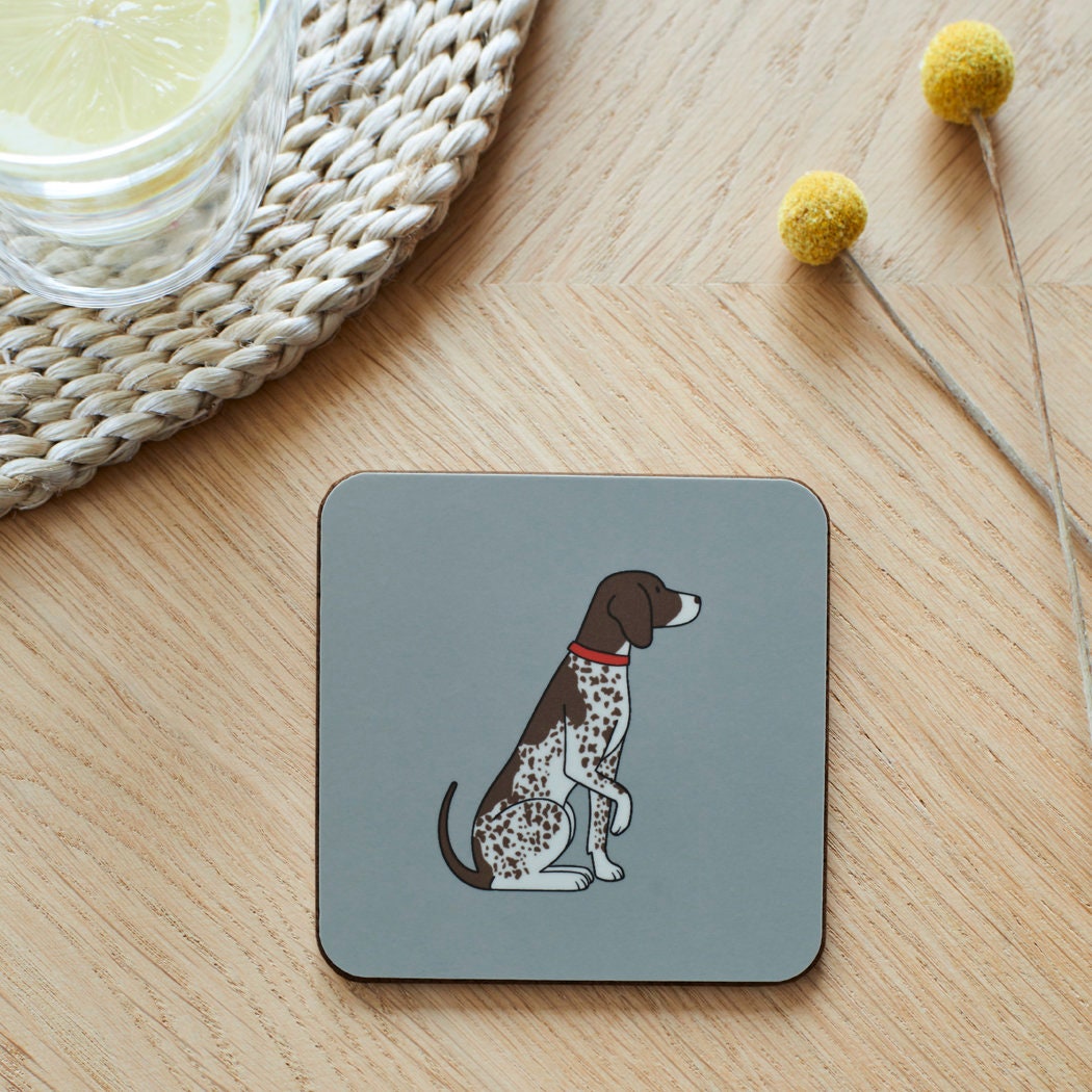 Close-up of German Shorthaired Pointer coaster — sustainably sourced eucalyptus wood with cork backing, heat-resistant and easy to wipe clean