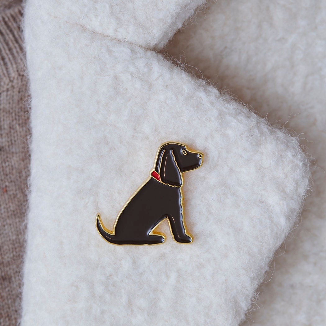 Black Cocker Spaniel enamel pin worn on a wool jacket collar — gold-plated dog pin, perfect gift for dog lovers