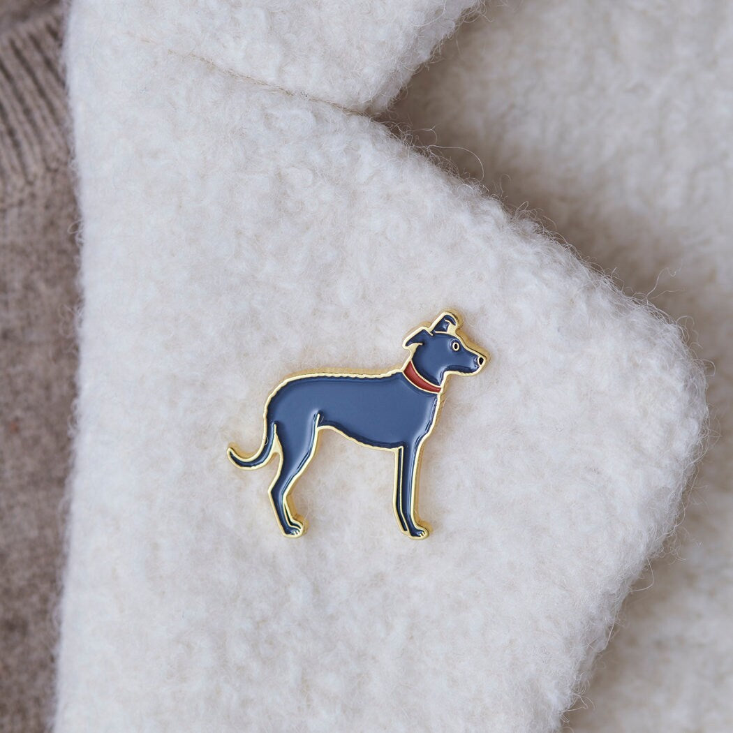 Lurcher enamel pin worn on a wool jacket collar — gold-plated dog pin, perfect gift for dog lovers