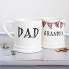 Ceramic Dad and Grandpa mugs with hand-drawn Union Jack bunting, displayed together as thoughtful Father’s Day gifts