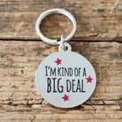 Close-up of 'I'm Kind Of A Big Deal' dog tag — silver-plated brass with red star design, personalised dog ID tag by Sweet William Designs 
