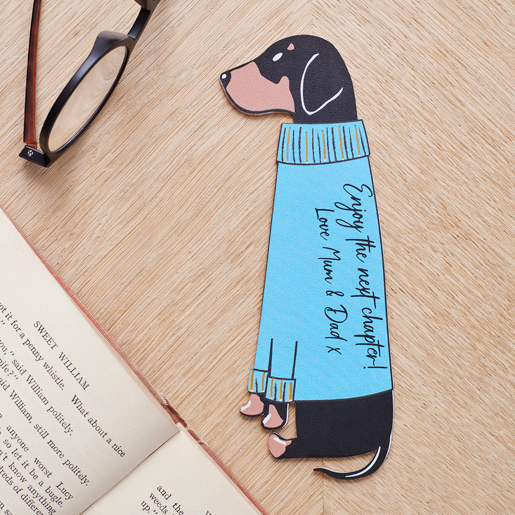 Personalised Dachshund bookmark laid flat showing custom messages — vegan PU leather dog lover gifts by Sweet William Designs