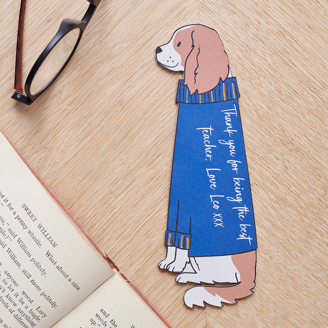 Personalised Cavalier King Charles Spaniel bookmark laid flat showing custom messages — vegan PU leather dog lover gifts by Sweet William Designs