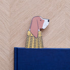 Basset Hound bookmark peeking out of navy book — illustrated dog in yellow jumper, vegan PU leather bookmark by Sweet William Designs