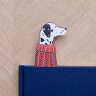 Dalmatian bookmark peeking out of navy book — illustrated dog in red jumper, vegan PU leather bookmark by Sweet William Designs