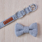 Grey tweed dog bow tie shown with a matching tweed dog collar