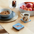 Sweet William Border Terrier coaster lifestyle shot — matching Border Terrier mug and coaster gift set