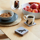 Black Cocker Spaniel coaster on desk — eucalyptus wood with cork backing, dog lover gift by Sweet William Designs