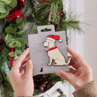 Apricot Cockapoo / Labradoodle Christmas tree decoration held in hands on backing card — Father Christmas hat and jingle bell collar, dog lover gift by Sweet William Designs