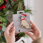 Pug Christmas tree decoration held in hands on backing card — Father Christmas hat and jingle bell collar, dog lover gift by Sweet William Designs