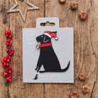 Black Labrador Christmas decoration on backing card — wooden dog decoration with Father Christmas hat and jingle bell collar, festive dog lover gift by Sweet William Designs