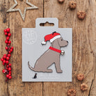 Chocolate Cocker Spaniel Christmas decoration on backing card — wooden dog decoration with Father Christmas hat and jingle bell collar, festive dog lover gift by Sweet William Designs