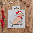 Golden Cocker Spaniel Christmas decoration on backing card — wooden dog decoration with Father Christmas hat and jingle bell collar, festive dog lover gift by Sweet William Designs