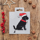 Black Cockapoo / Labradoodle Christmas decoration on backing card — wooden dog decoration with Father Christmas hat and jingle bell collar, festive dog lover gift by Sweet William Designs