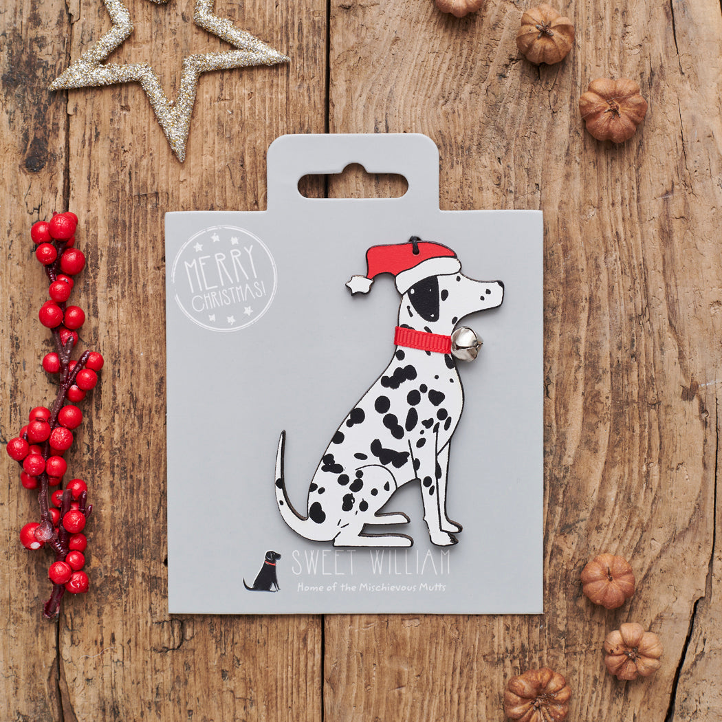 Dalmatian Christmas decoration on backing card — wooden dog decoration with Father Christmas hat and jingle bell collar, festive dog lover gift by Sweet William Designs