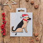 German Shepherd Christmas decoration on backing card — wooden dog decoration with Father Christmas hat and jingle bell collar, festive dog lover gift by Sweet William Designs