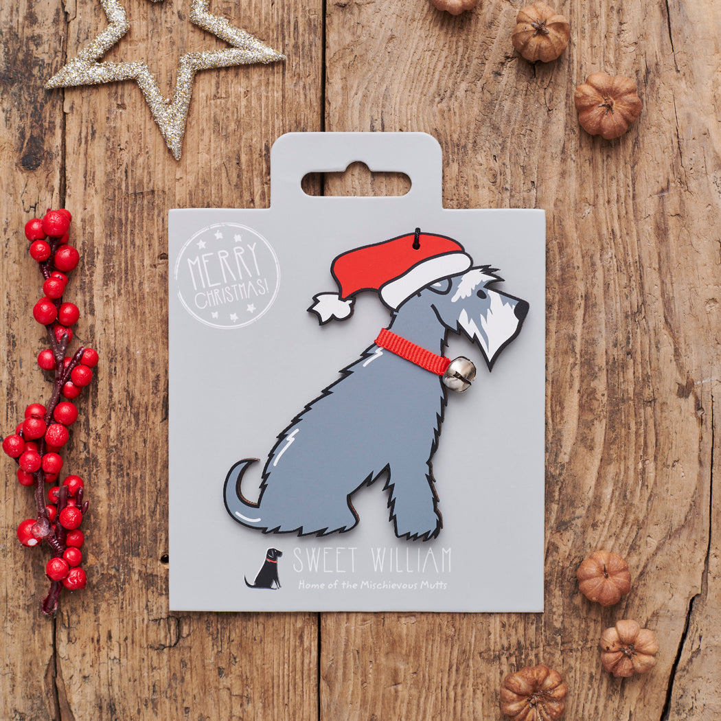 Grey Schnauzer Christmas decoration on backing card — wooden dog decoration with Father Christmas hat and jingle bell collar, festive dog lover gift by Sweet William Designs