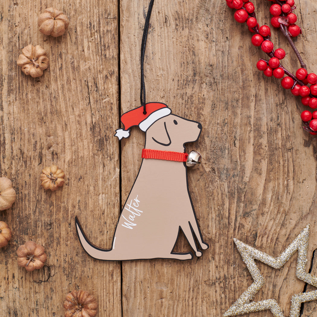Personalised Chocolate Labrador Christmas decoration with name — wooden dog decoration with Father Christmas hat and jingle bell collar, thoughtful dog lover gift by Sweet William Designs