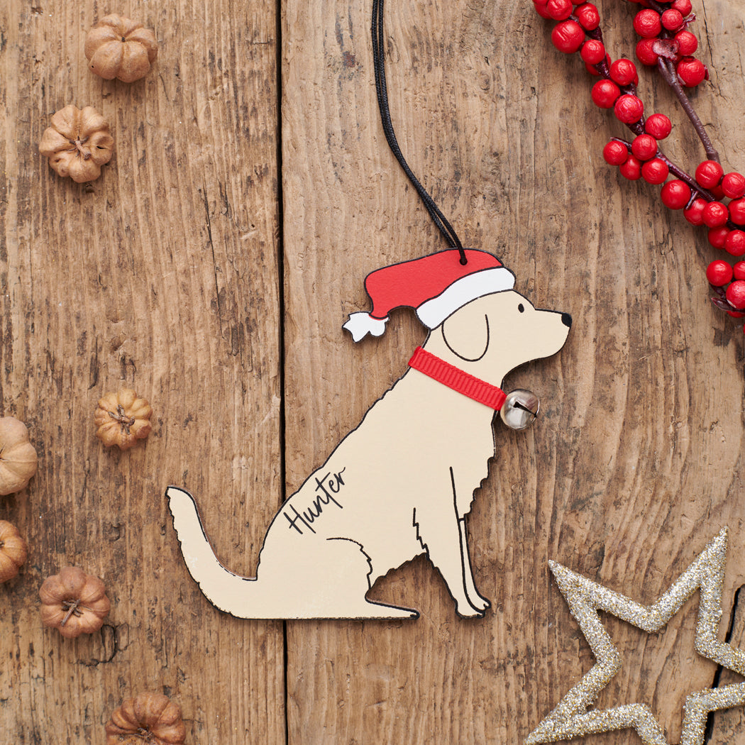 Personalised Golden Retriever Christmas decoration with name — wooden dog decoration with Father Christmas hat and jingle bell collar, thoughtful dog lover gift by Sweet William Designs
