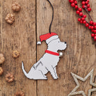 Personalised Westie Christmas decoration with name — wooden dog decoration with Father Christmas hat and jingle bell collar, thoughtful dog lover gift by Sweet William Designs