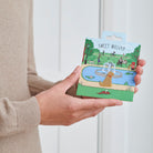 Yellow Labrador enamel dog pin held in hands on illustrated park backing card — gold-plated dog lover gift by Sweet William Designs