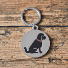 Close-up of Black Cockapoo / Labradoodle dog ID tag — silver-plated brass with Cockapoo illustration, personalised dog tag by Sweet William Designs