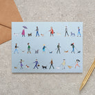 Dog Walkers greeting card — illustrated parade of dog walkers and their dogs, dog lover gift by Sweet William Designs