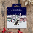 Black Cocker Spaniel Christmas dog pin on festive village backing card — gold-plated enamel dog lover gift by Sweet William Designs