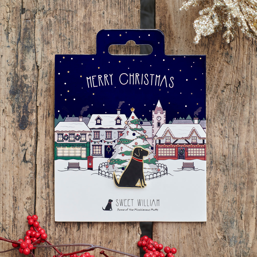 Black Labrador Christmas dog pin on festive village backing card — gold-plated enamel dog lover gift by Sweet William Designs