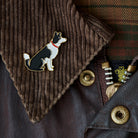 Close-up of Border Collie enamel pin attached to a corduroy jacket collar — gold-plated dog pin by Sweet William Designs