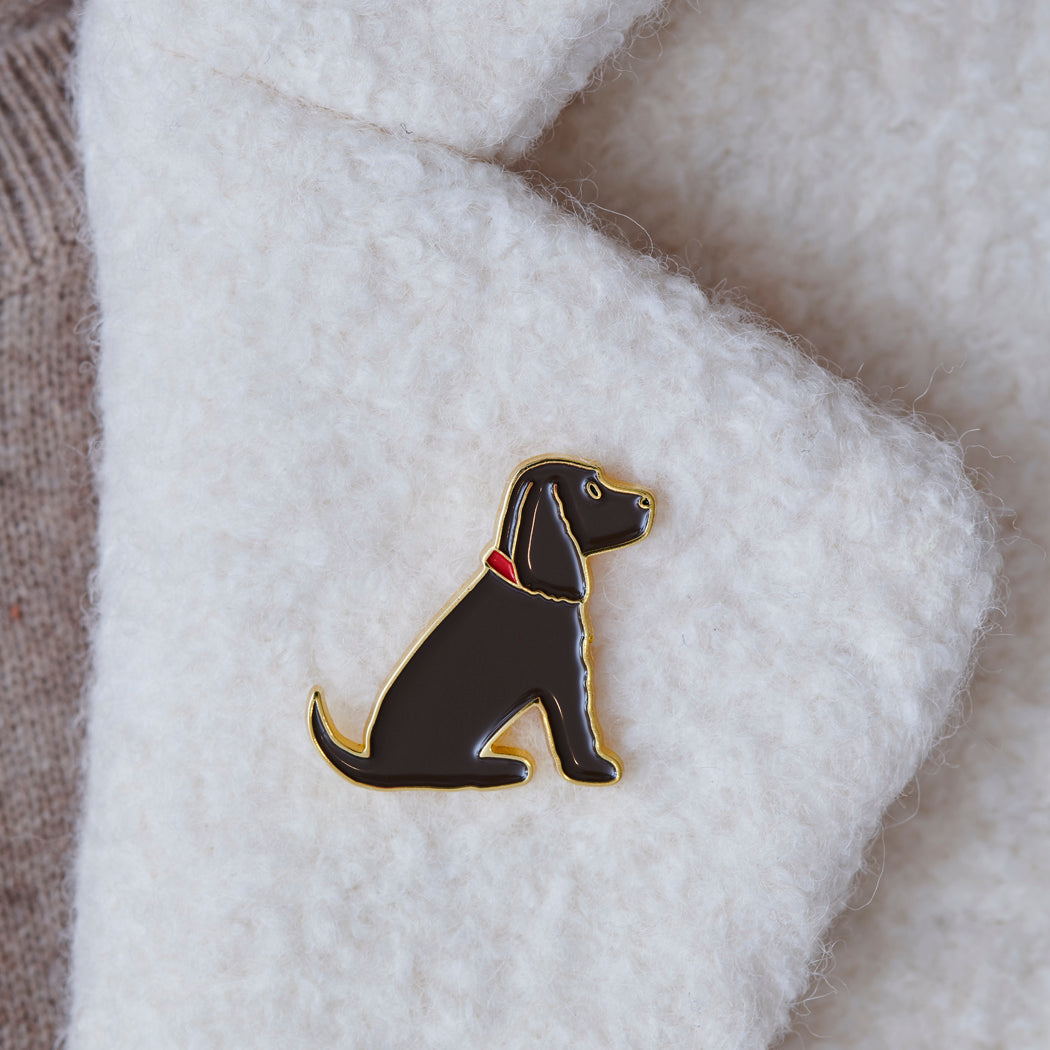 Black Cocker Spaniel dog enamel pin styled on the collar of a wool jacket, designed by Sweet William Designs
