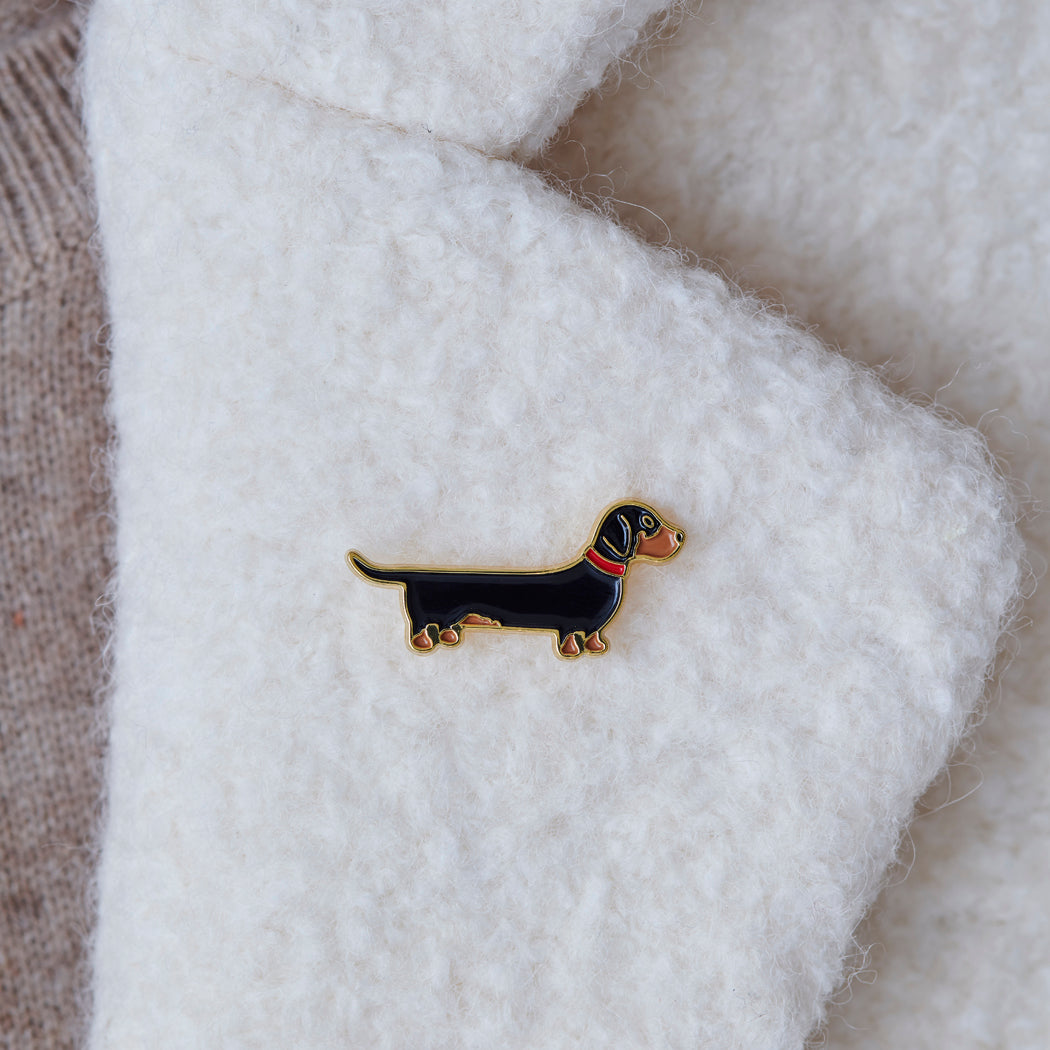 Close-up of Dachshund enamel pin attached to a wool jacket collar — gold-plated dog pin, Christmas gift for Dachshund lovers