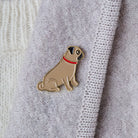 Close-up of Pug enamel pin attached to a wool jacket collar — gold-plated dog pin, Christmas gift for Pug lovers