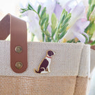 Liver & White Springer Spaniel enamel pin styled on a Sweet William jute bag — gold-plated dog pin, perfect gift for dog lovers