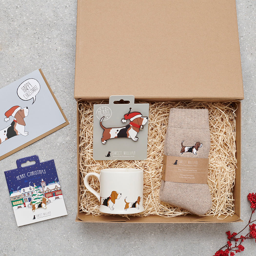 Basset Hound Christmas gift hamper with a matching Basset Hound Christmas pin, socks, mug, Christmas decoration and greeting card by Sweet William Designs