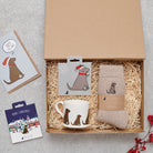 Chocolate Labrador Christmas gift hamper with a matching Chocolate Lab Christmas pin, socks, mug, Christmas decoration and greeting card by Sweet William Designs