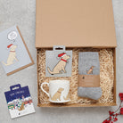 Golden Retriever Christmas gift hamper featuring decoration, mug, socks and greeting cards — thoughtful dog lover gift set by Sweet William Designs