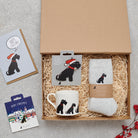 Black Schnauzer Christmas gift hamper with a matching Black Schnauzer Christmas pin, socks, mug, Christmas decoration and greeting card by Sweet William Designs
