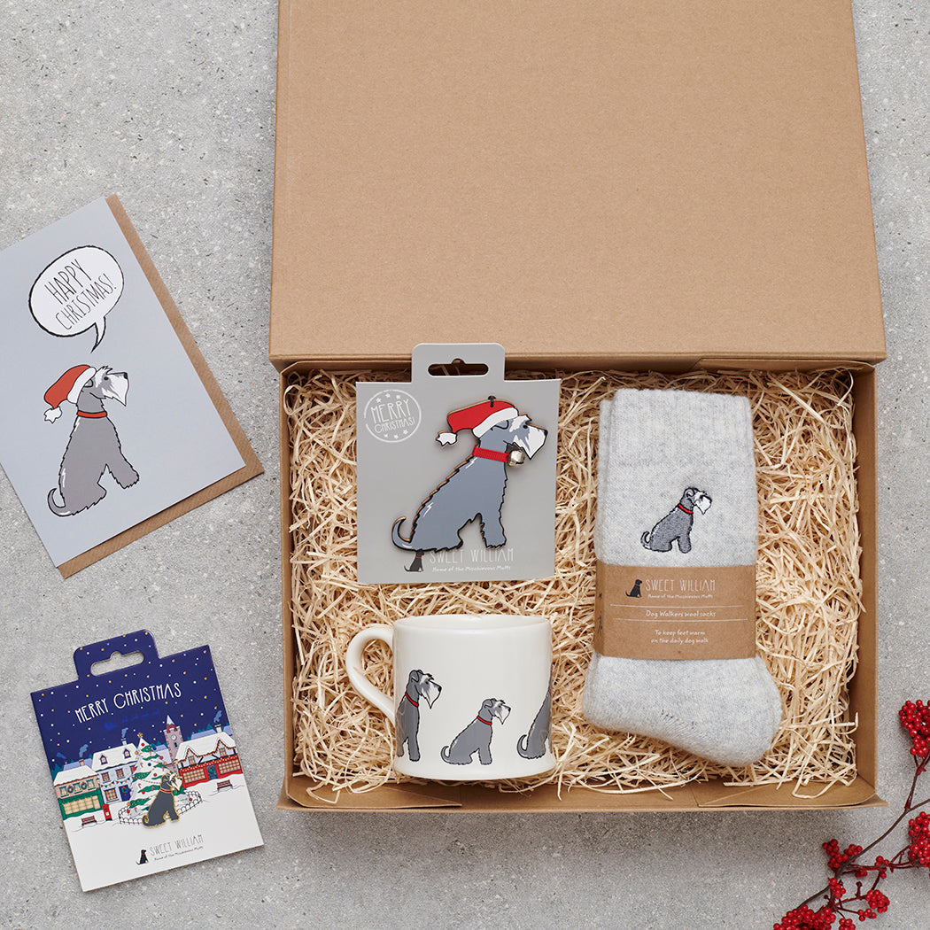 Grey Schnauzer Christmas gift hamper with a matching Grey Schnauzer Christmas pin, socks, mug, Christmas decoration and greeting card by Sweet William Designs