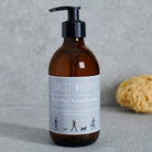 Close-up of Dog Walkers Revival Hand Wash amber glass bottle — vitamin E hand wash, vegan dog walker gift by Sweet William Designs