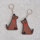 Chocolate Labrador keyring showing both sides — double-sided PVC design with Sweet William's classic illustration