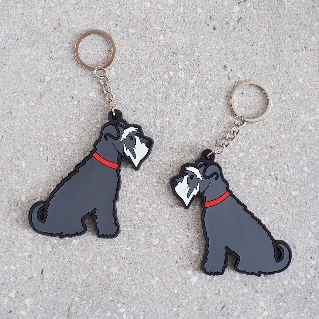 Grey Schnauzer keyring showing both sides — double-sided PVC with Sweet William's classic illustration