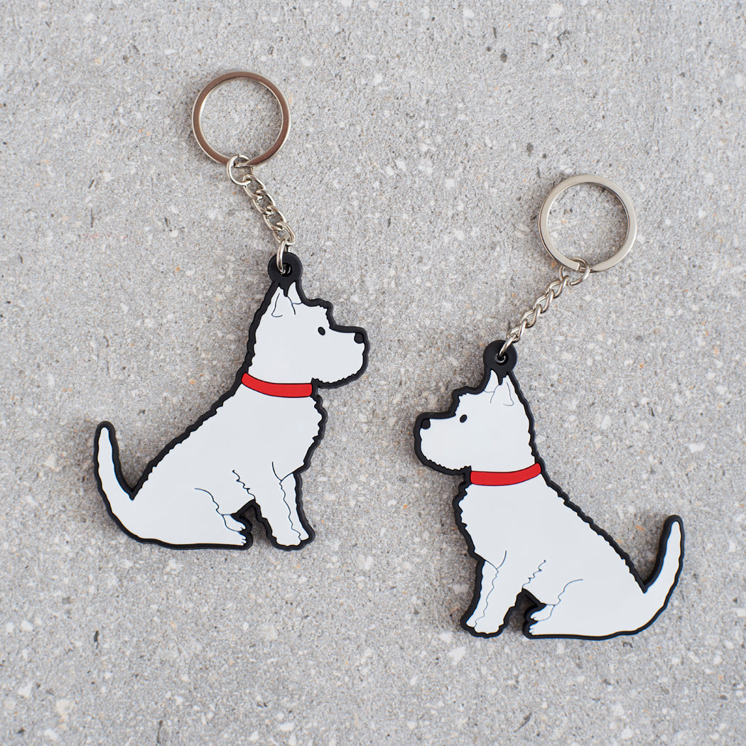 Westie keyring lifestyle shot — classic Westie design on double-sided PVC keyring by Sweet William Designs