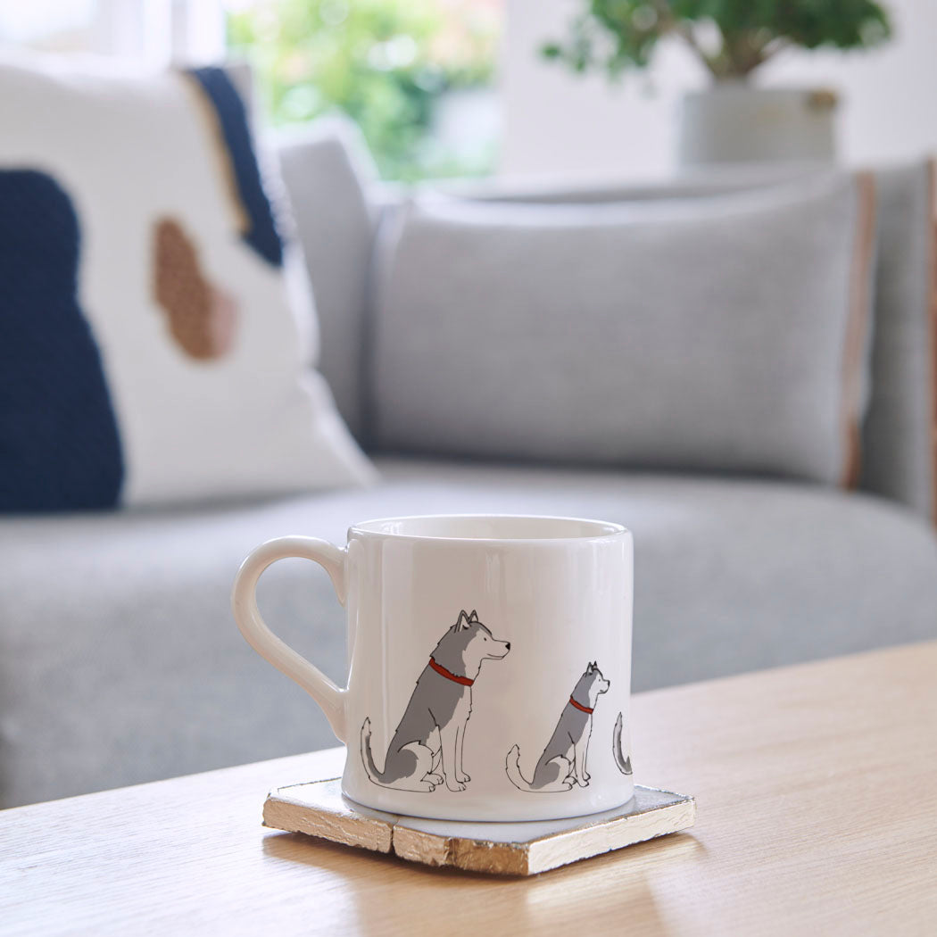 Husky mug on coffee table — illustrated ceramic dog mug by Sweet William Designs