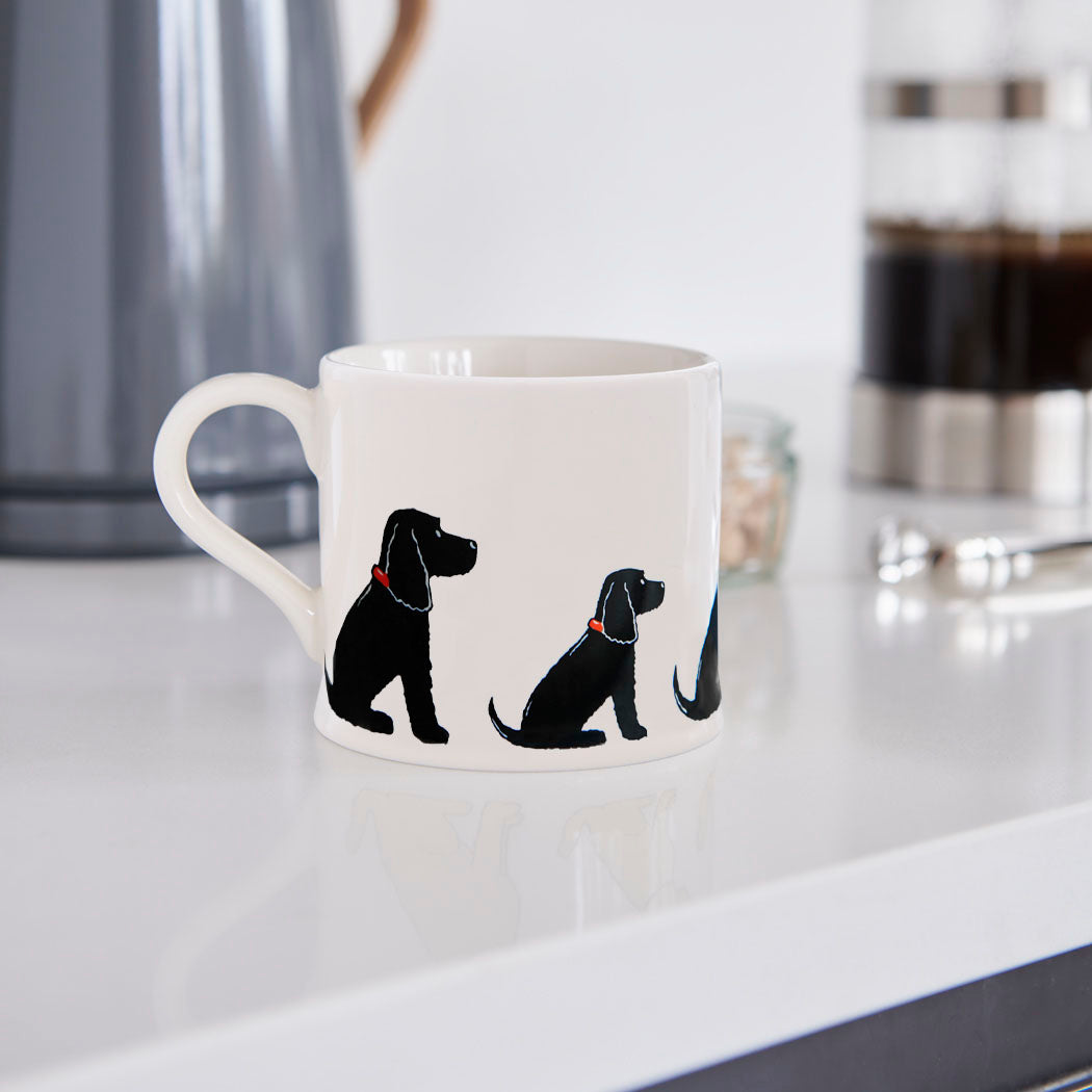 Sweet William Black Cocker Spaniel Mug in a kitchen setting — illustrated Black Cocker Spaniel ceramic mug