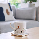 Sweet William Jack Russell Mug on a coffee table — illustrated Jack Russell repeat pattern ceramic mug