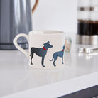 Sweet William Lurcher Mug in a kitchen setting — illustrated Lurcher ceramic mug