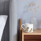 Sweet William Pug Mug on a bedside table — Pug dog lover gift mug