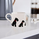Sweet William Black Schnauzer Mug in a kitchen setting — illustrated Black Schnauzer ceramic mug