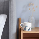 Sweet William Grey Schnauzer Mug on a bedside table — Grey Schnauzer dog lover gift mug
